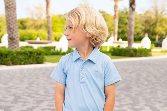 little boy looking down the street