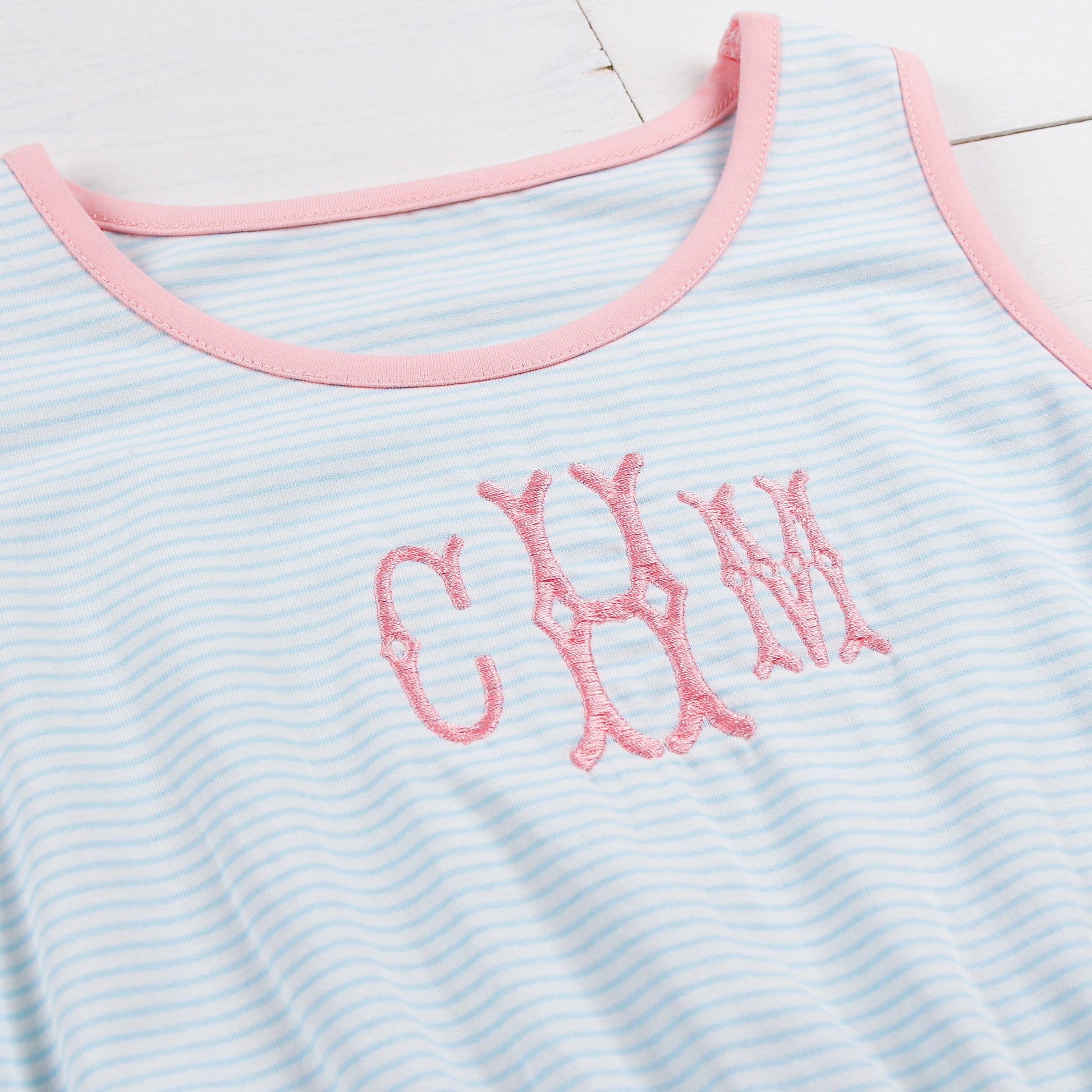 close up of monogram on Tennis Club Jordan Dress