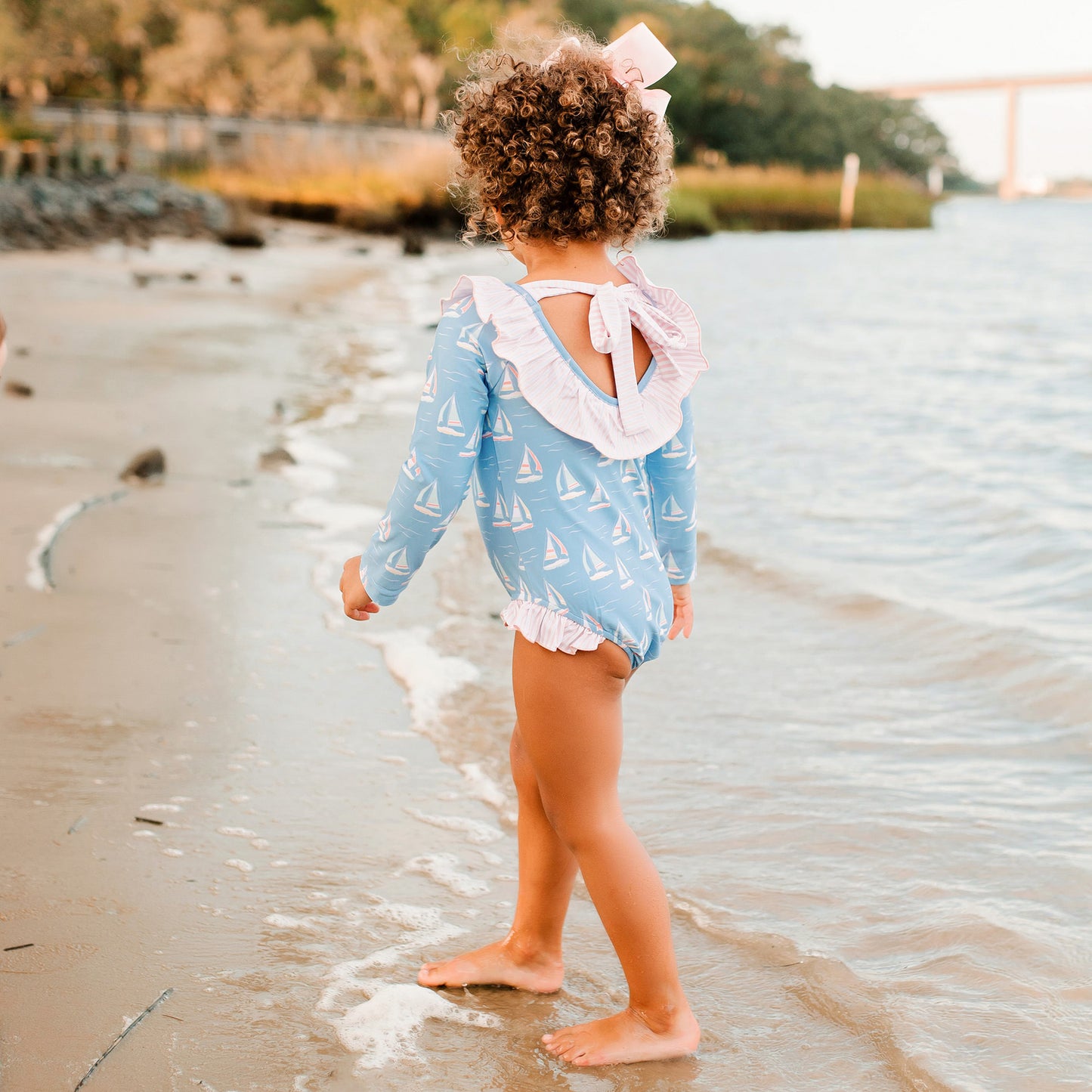 little girl in Catalina One-Piece Rash Guard
