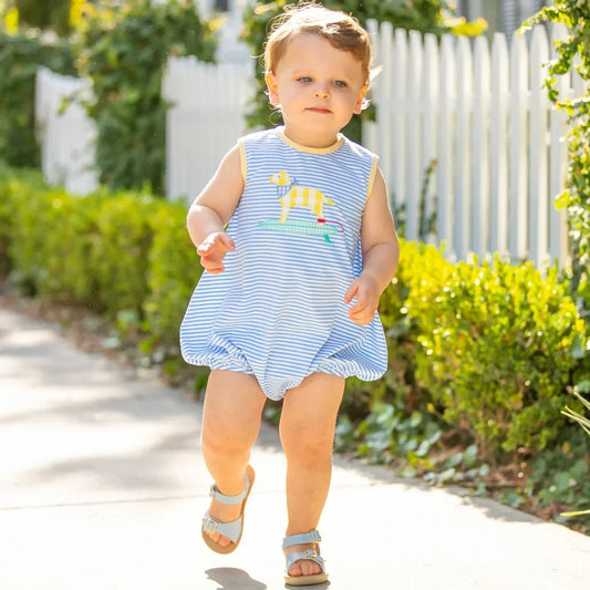 little boy in spring bubble outfit