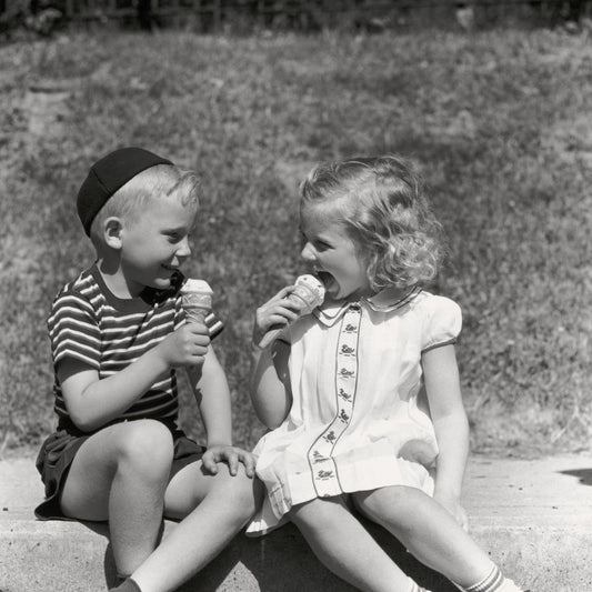 a boy and girl eating ice cream circa 1960 - Smocked Baby Clothes for Girls