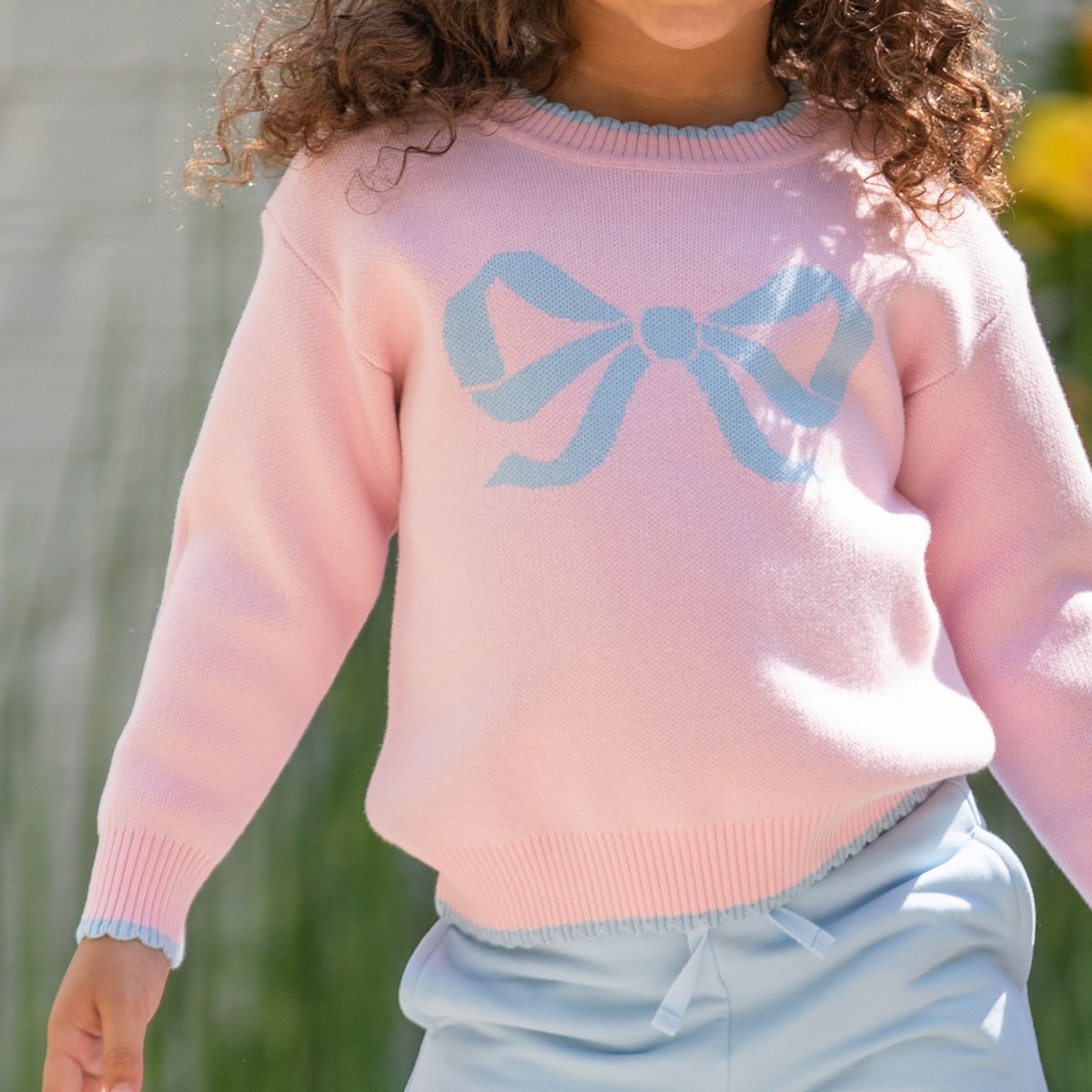 Close-up of Bow Sweater Close