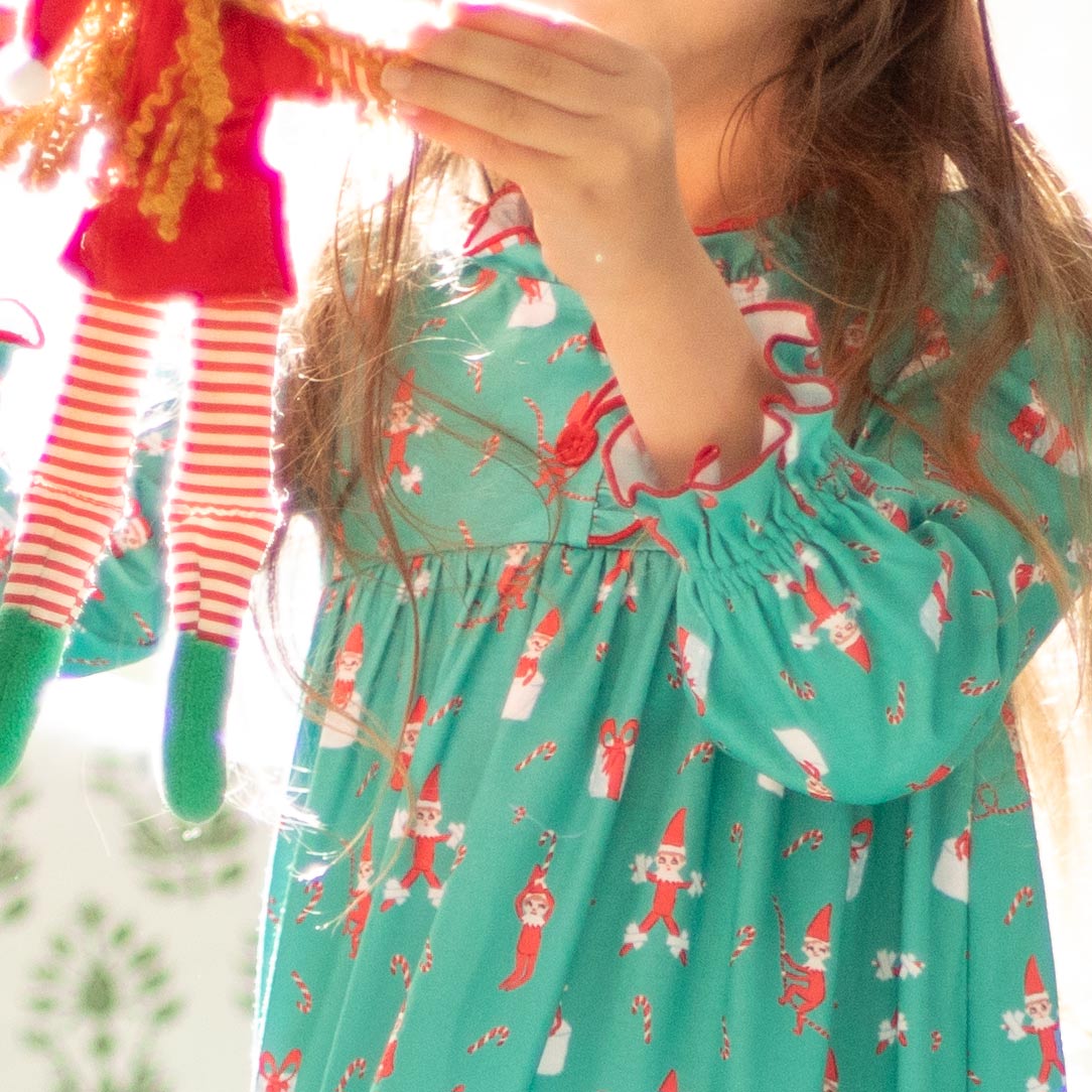 Close-up detail of Holiday Helpers Gown Doll