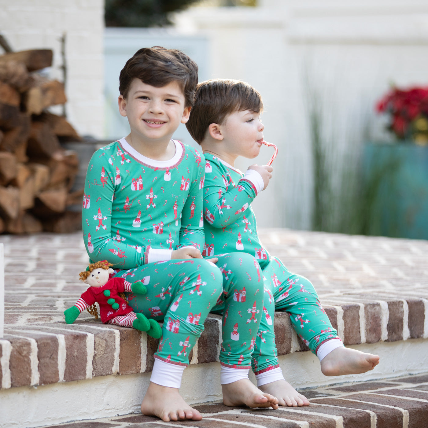 Matching sibling style for Holiday Helpers Bamboo Onesie
