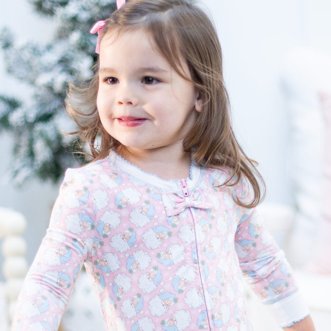 Close-up detail of Holly Jolly Pink Bamboo Onesie