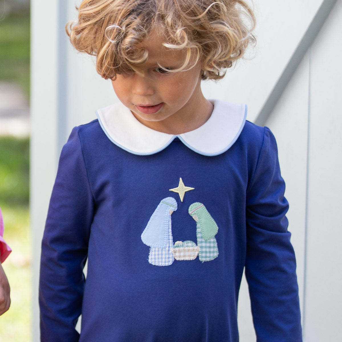 Baby boys navy Nativity romper with Mary, Joseph and Baby Jesus appliqué
