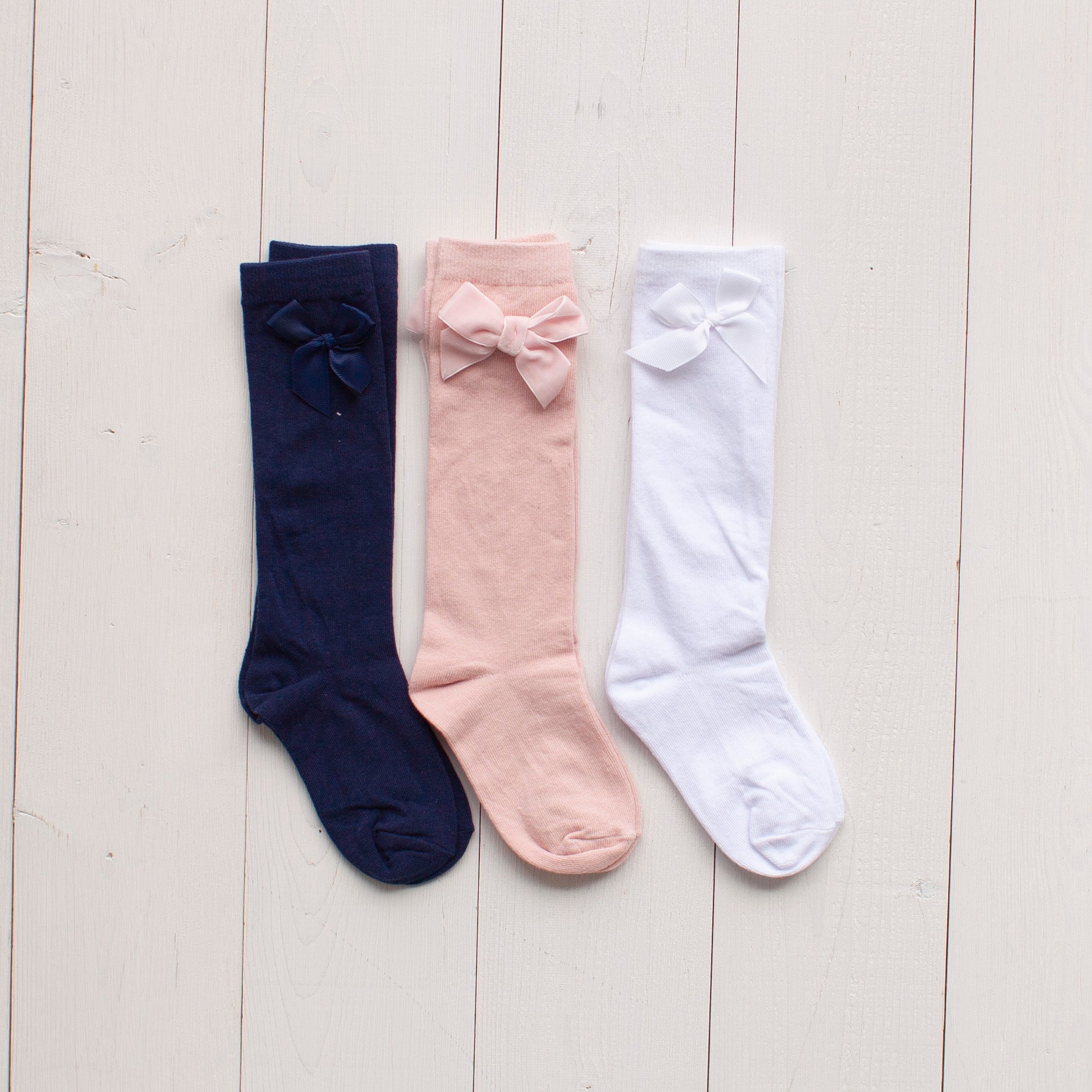 three pairs of socks