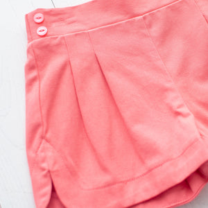 close up of coral shorts for girls