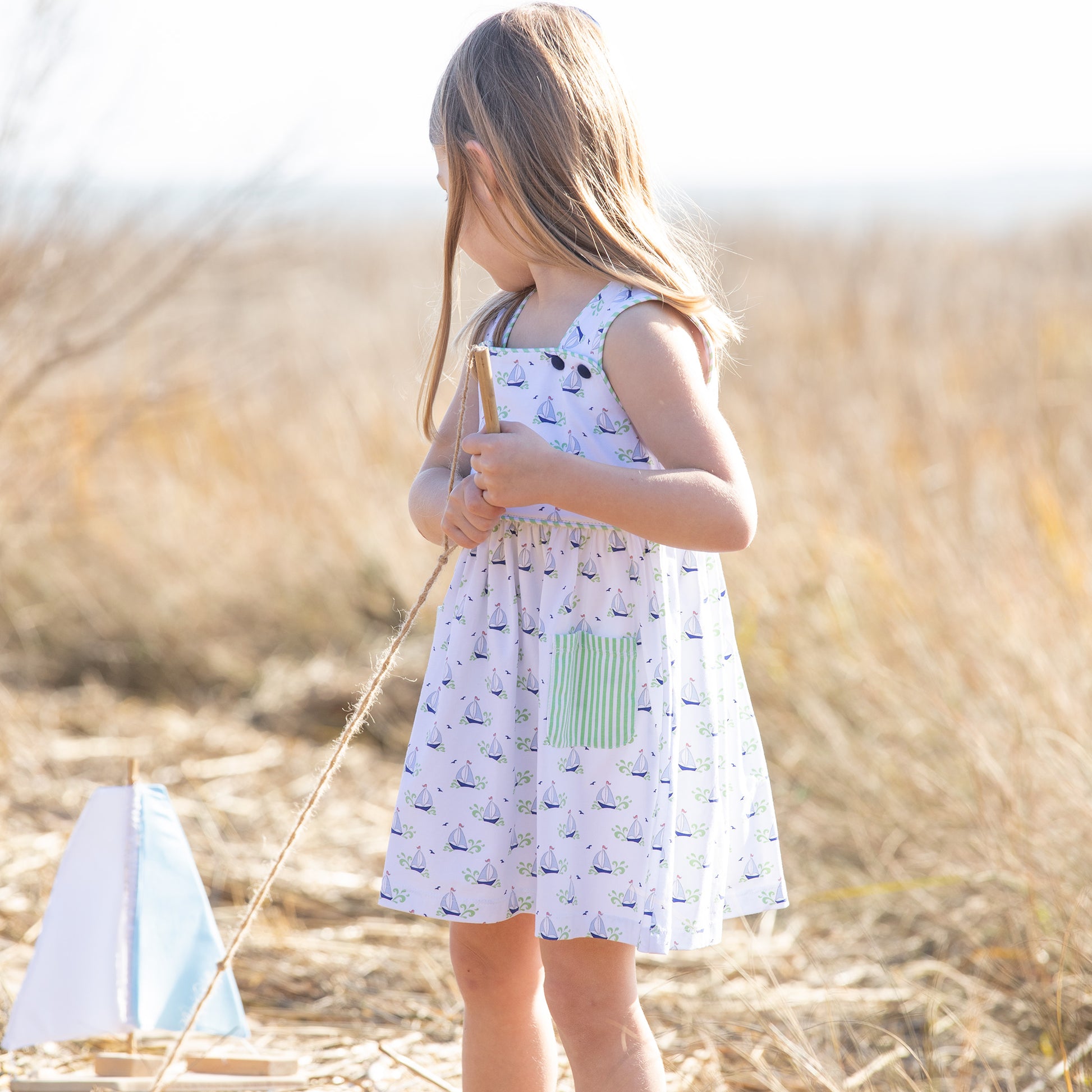 little girl wearing Beneteau Pocket Dress