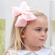 Load image into Gallery viewer, little girl wearing the Blush Biggie Bow