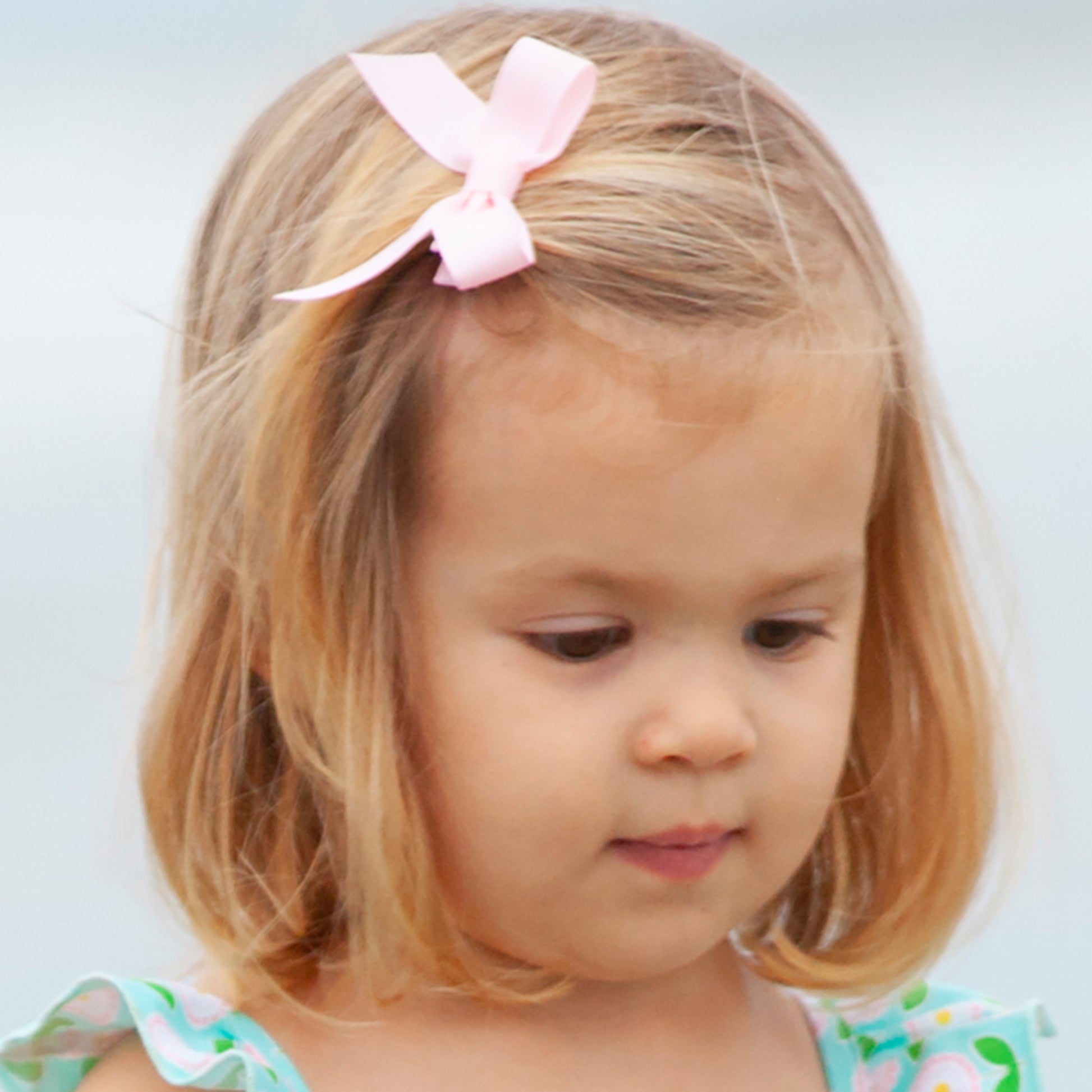 little girl wearing Blush Bitty Bow