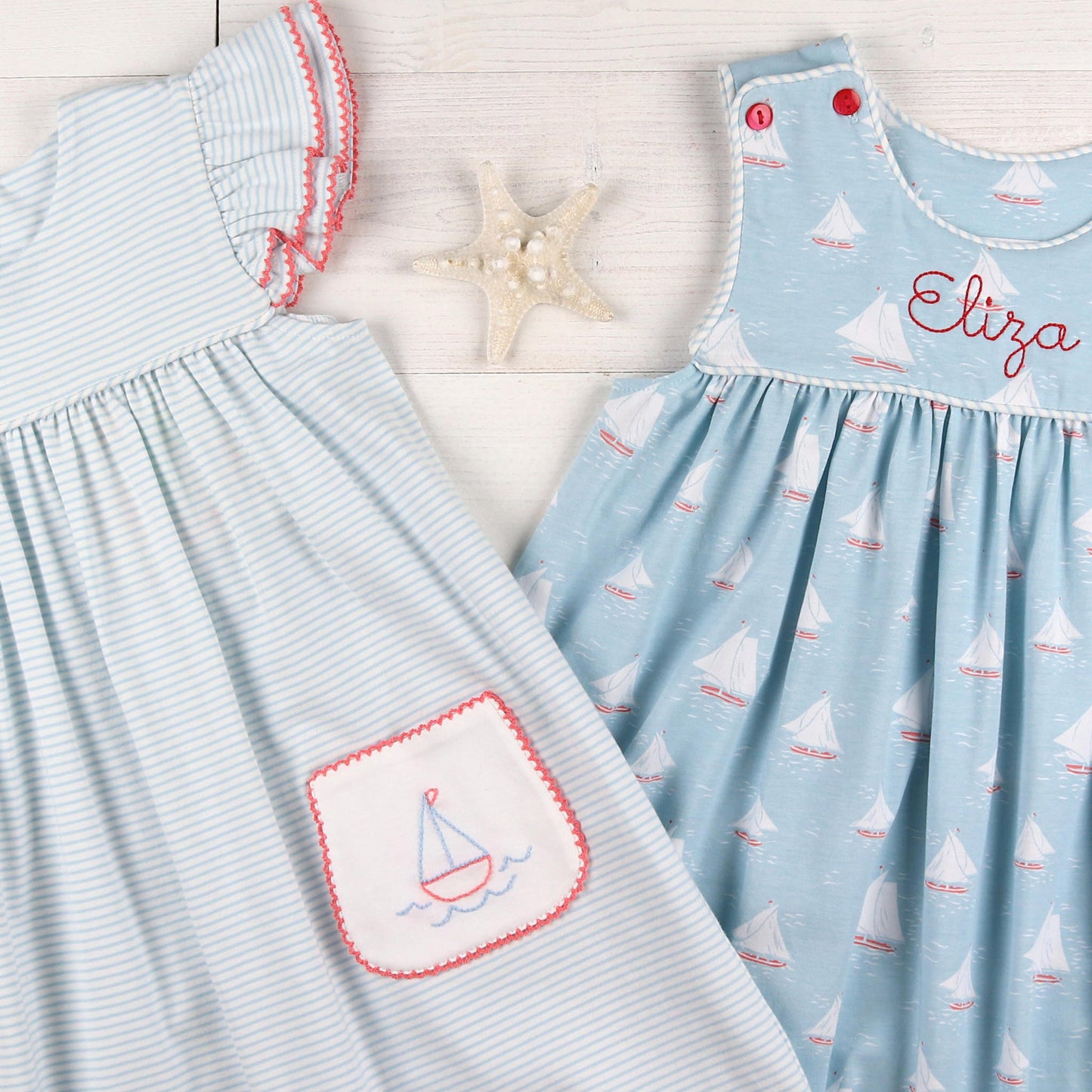 flatlay of two dresses and a starfish shell