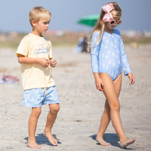 Load image into Gallery viewer, little boy wearing Boys Catalina Boardies walking down the beach with a little girl