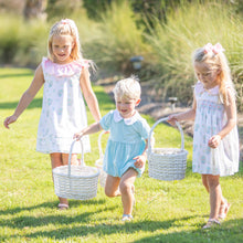 Load image into Gallery viewer, 2 little girls and a little boy in Briggs Blue Knit Romper Bubble carrying easter baskets