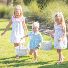 Load image into Gallery viewer, three kids at an Easter egg hunt running around