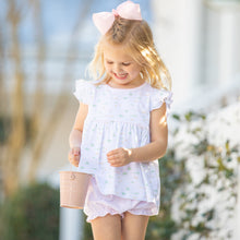 Load image into Gallery viewer, little girl smiling walking down the sidewalk holding a pink pale