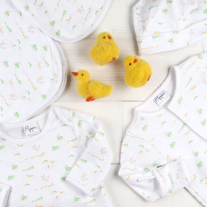 flatlay of cotton baby pajamas