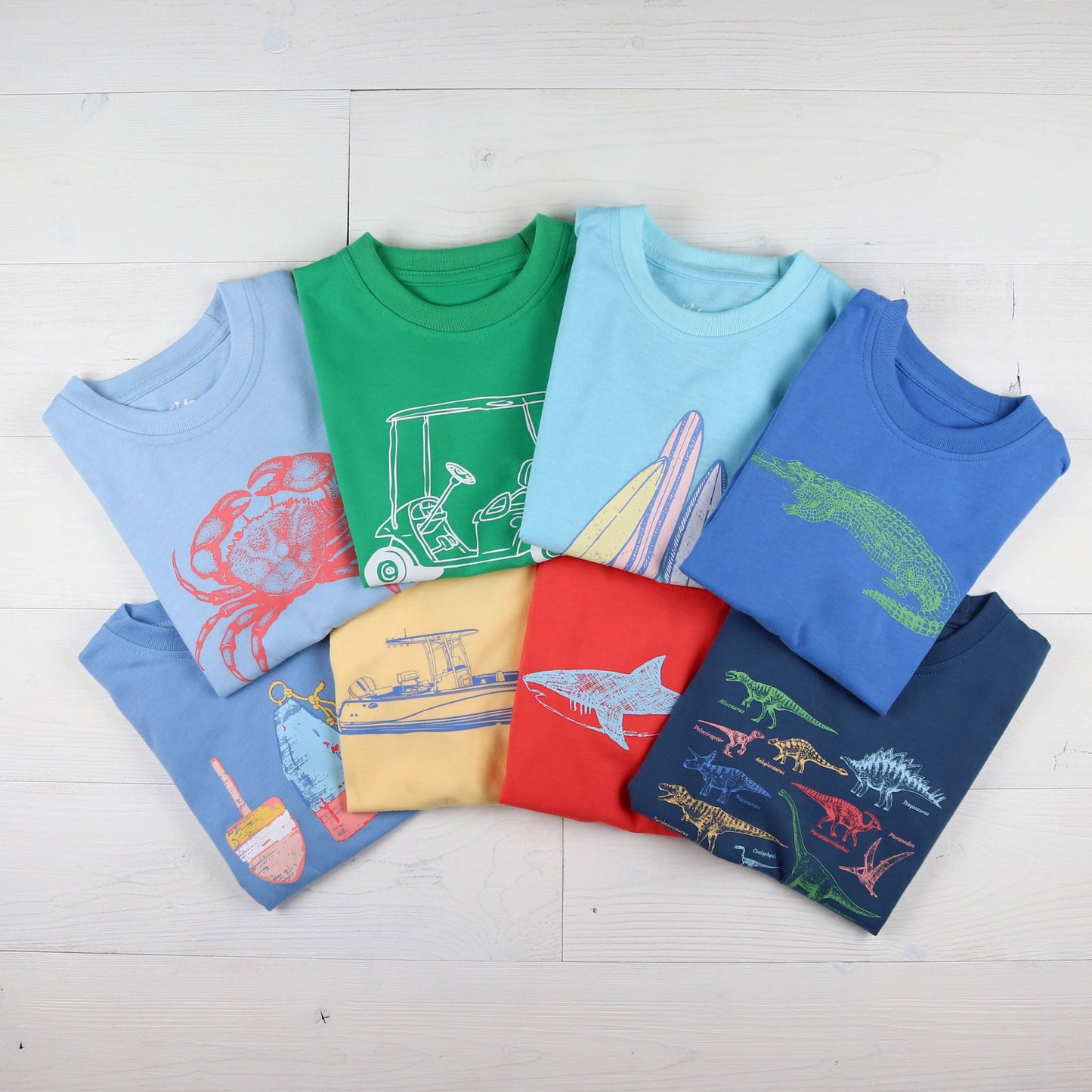 flatlay of grphic tee shirts for boys