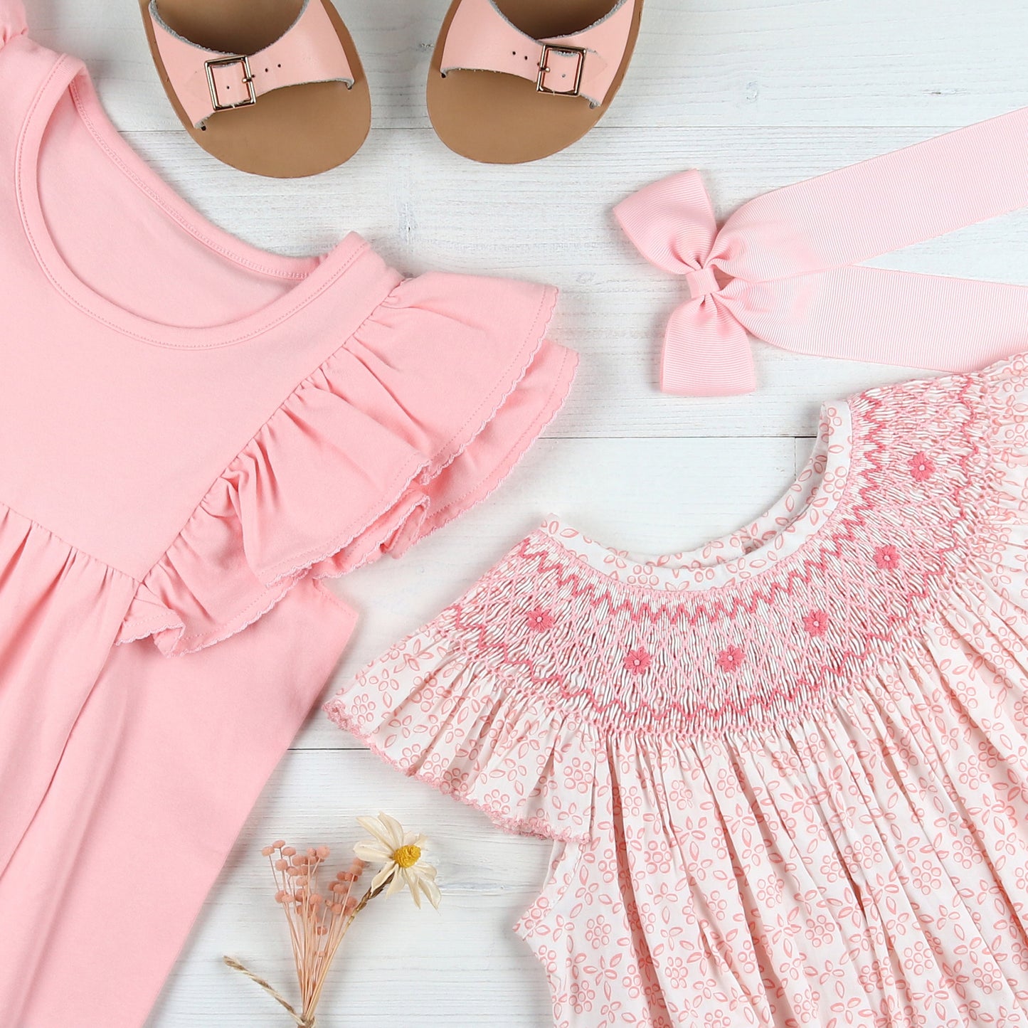 Girl's Pink Swing Top, smocked dress and pink sandal flatlay