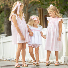 Load image into Gallery viewer, three little girls holding hands and smiling at each other on a sidewalk