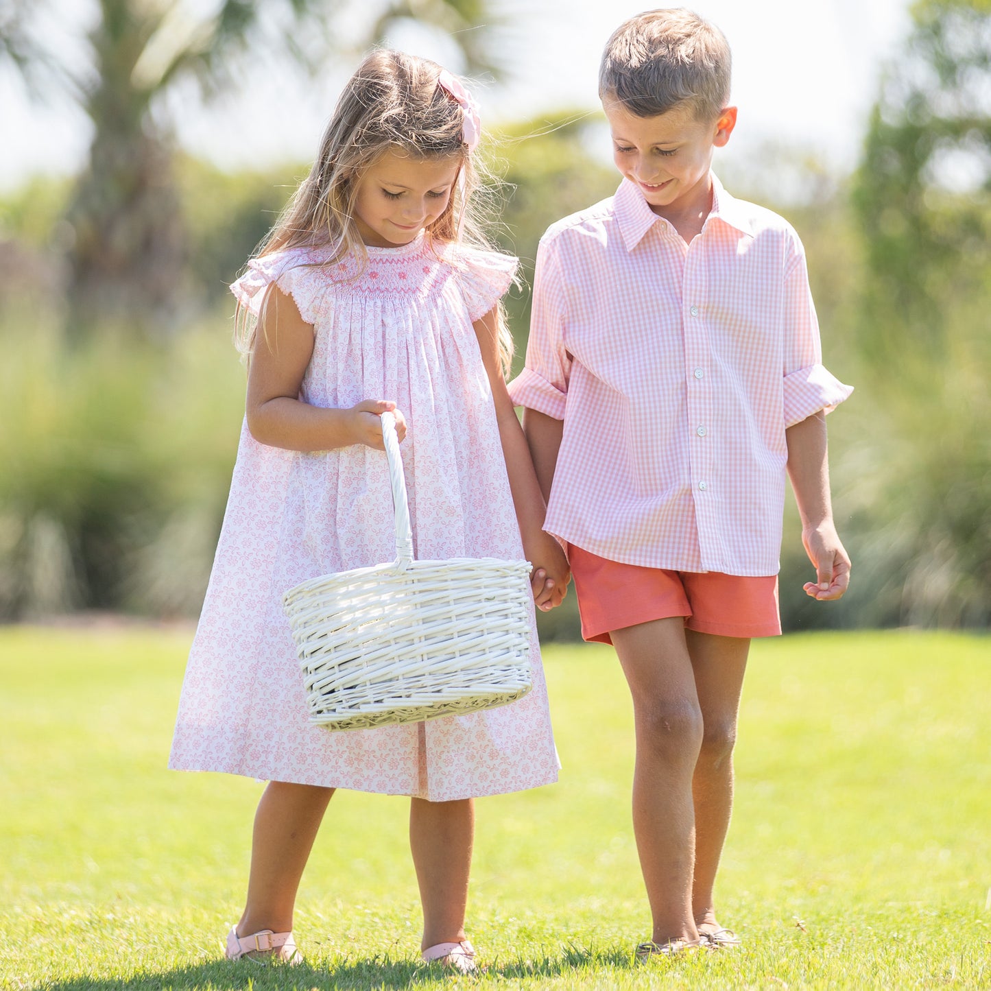 little boy and girl at an Easter egg hunt