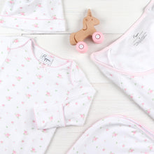 Load image into Gallery viewer, flatlay of sweet baby clothes