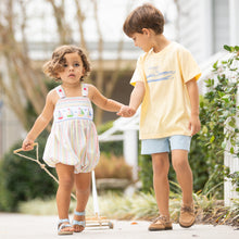 Load image into Gallery viewer, 2 little boys holdindg hands and pulling a sailboat toy