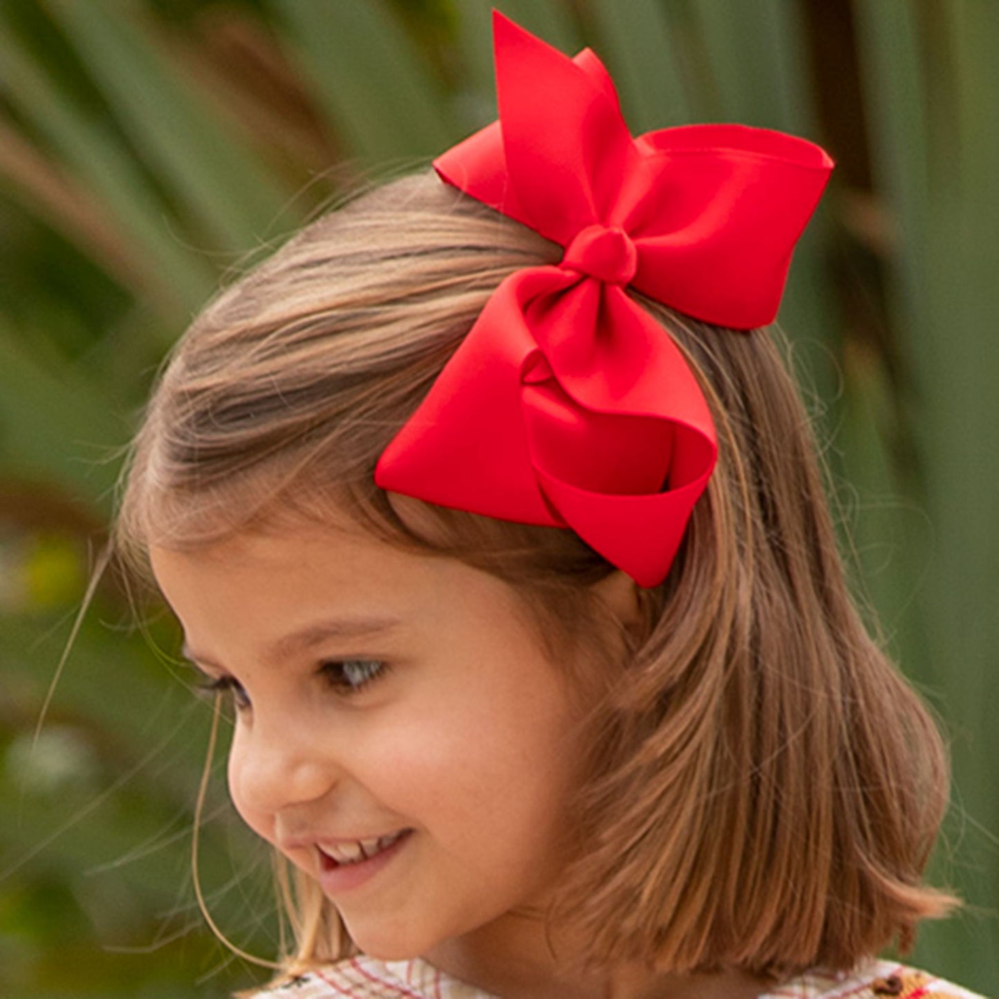 little girl wearing a Red Biggie Bow