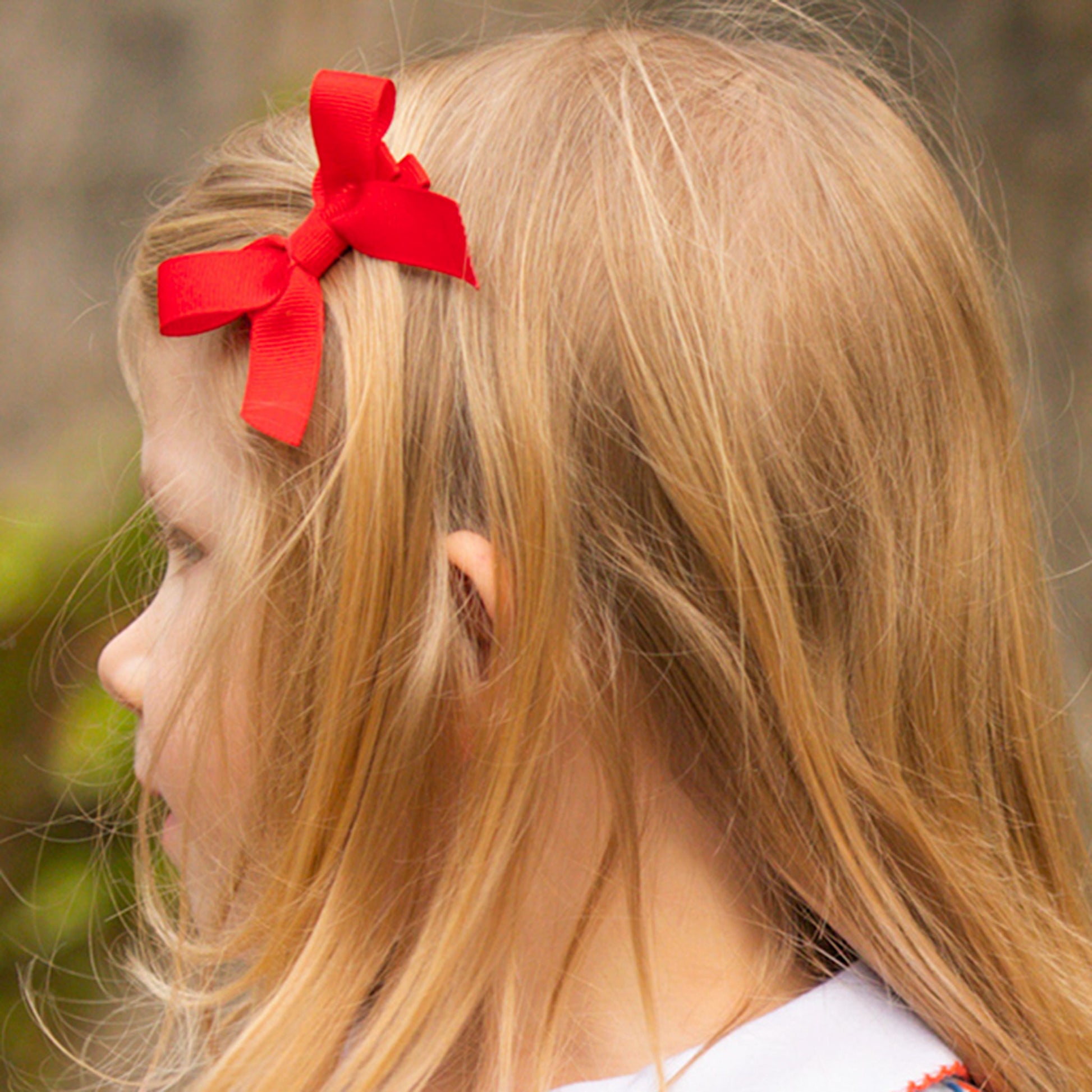 little girl wearing a Red Bitty Bow