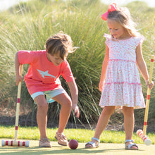 Load image into Gallery viewer, boy and girl in Spring Fling Tier Dress playing croquet