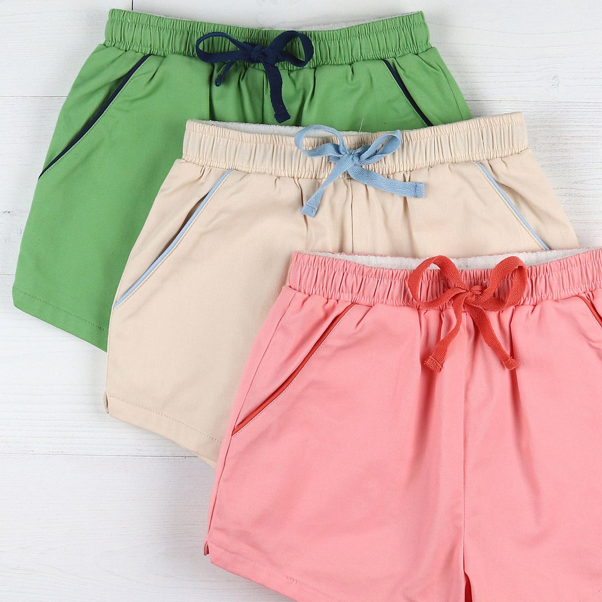 green, khaki and coral shorts