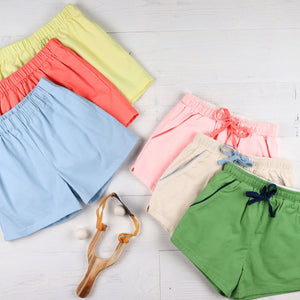 flatlay of different colored shorts