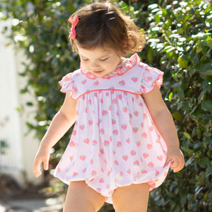little girl wearing a Strawberry Pickin’ Bubble