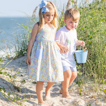 Load image into Gallery viewer, little girl in Sunny Floral Bow Back Dress and brother holding hands on the beach