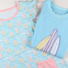 Load image into Gallery viewer, flatlay of Surfs Up Graphic Tee and a dress