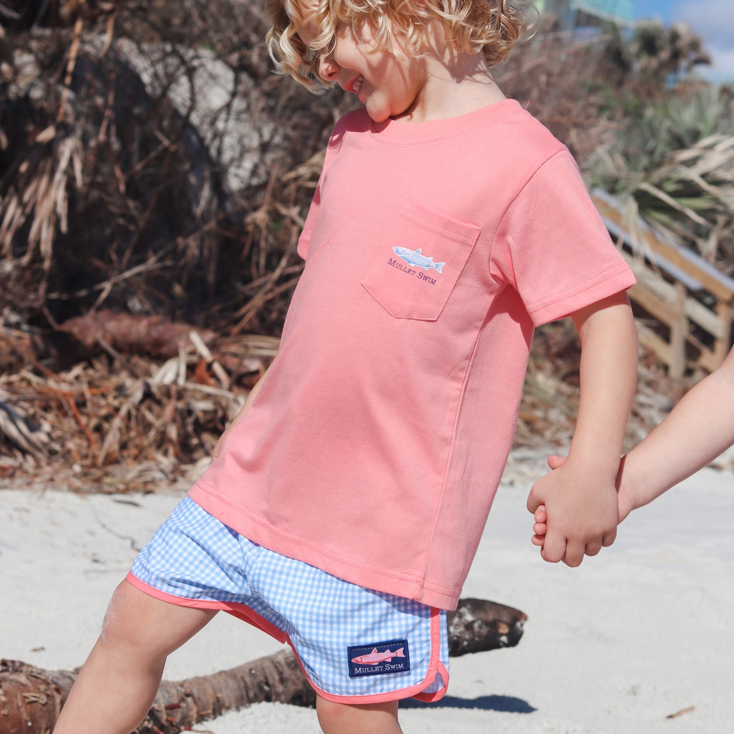 little boy holding hands with his sister wearing Big Catch Boy's Pocket Tee